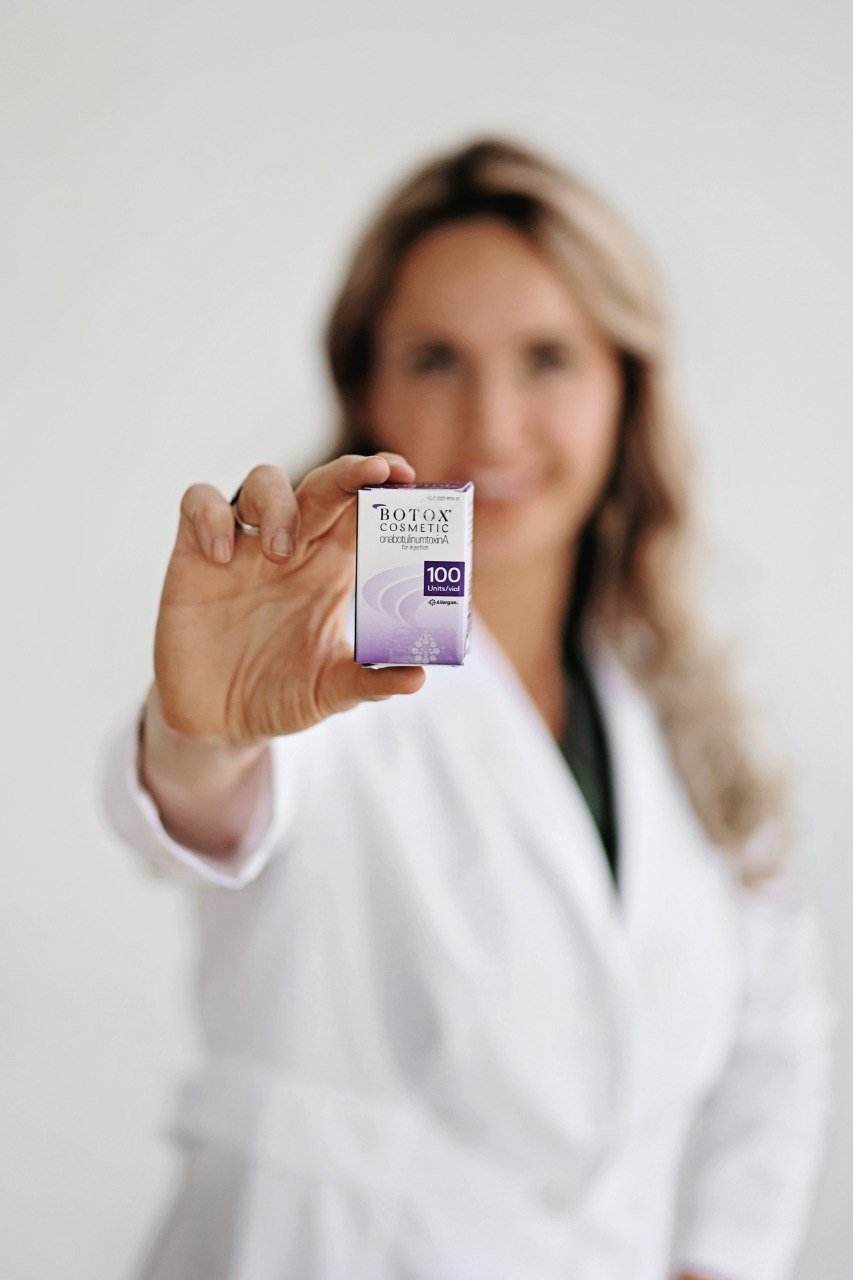 Board-certified dermatology provider holding Botox Cosmetic at Juniper Dermatology in Bend, Oregon